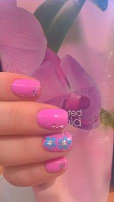 gel manicure with pink and flowers