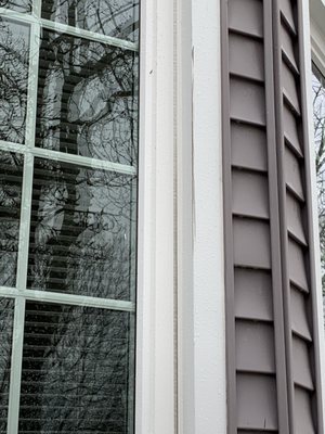 Damaged windows and siding