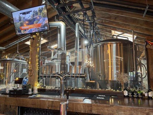 Behind the main bar looking into brewing room