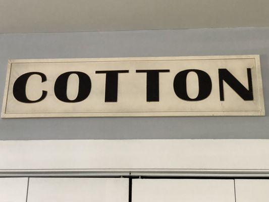 Cotton metal sign