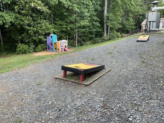 Corn hole and small play place