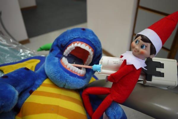 Our Elf on a Shelf, Hermes, making a temporary for Azul the Dragon