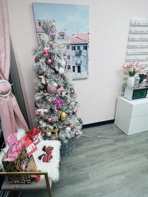 Cute pink tree in her studio for the holidays and ties into her pink theme