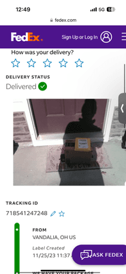 The picture of the driver took which is clearly only one of my packages and the Amazon package that was previously delivered.