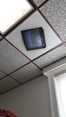 TV on ceiling for kids while they get their dental work done.