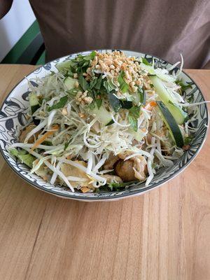 Cambo noodle salad with mini egg rolls, cabbage , carrots, bean sprouts , basil, dressing with chicken as the protein