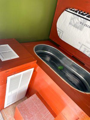 Custom ice bath including  a filtration and sanitization system, and drain