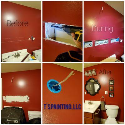 Installed A vanity light and a light switch. Red paint to blend in after cutting out the drywall. Beautiful job. 
502.415.6885 T's Painting.