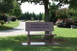 Our cemetery offers several unique memorials like this solid granite park bench.