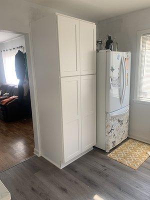 Moved the fridge, revised electrical, and installed the pantry