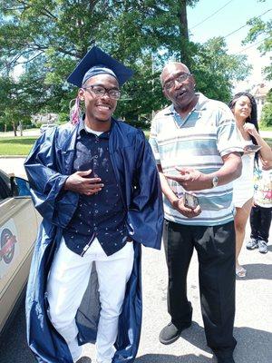 My stepfather and I at my graduation!