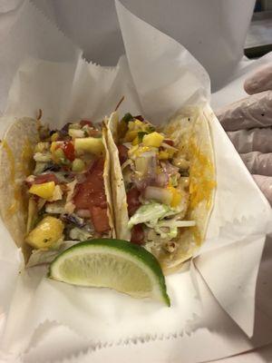 Grouper tacos- flour tortilla w/ cheddar jack cheese, slaw, chipolte mayo and topped with homemade mango salsa