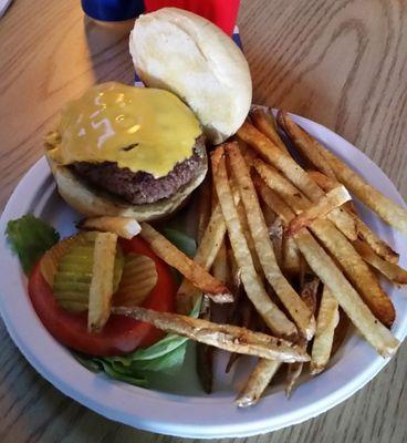 Cheeseburger and hand-cut fresh fries at The Whitehouse Bar & Grill