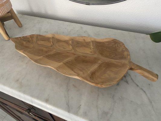 Found this beautiful wood leaf tray made in Indonesia.