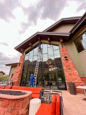 The DSS team cleans the windows at Springhill Suites by Marriot in Springdale near Zion National Park.