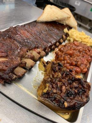 Wood fired ribs, sweet potato casserole, baked beans and Mac and cheese.