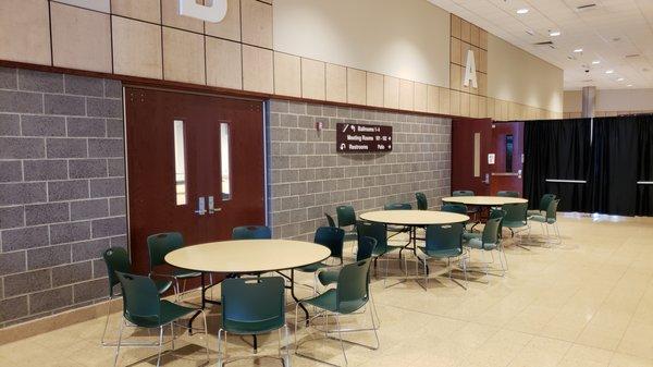 Seating outside of the Exhibit Hall for Cafe.