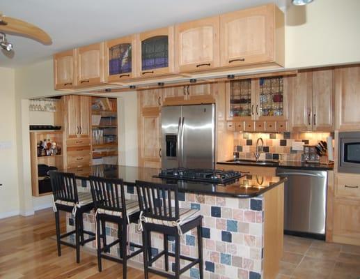 Kitchen redesign to open up space. There was a wall where the island is. This was a galley kitchen before.