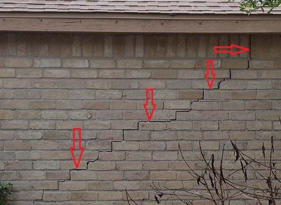 Ground to Roof Stair-Step Brick Crack