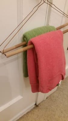 Nice that they hung the small sweaters like this. I assume so they wouldn't stretch.