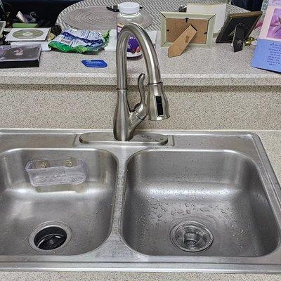 Installed a new kitchen sink faucet.