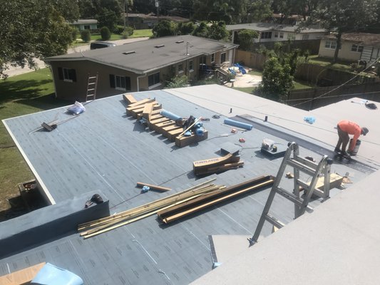 Installing a new 20 year CertainTeed self adhering modified roof in College Park. This roofing system is specifically for low slope roofs.