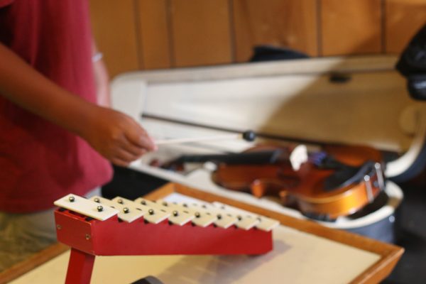 Using the step bells to teach the musical scale.