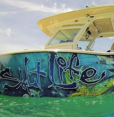 Uh huh! Who installs the Salt Life Boat Wraps? You guessed it, Stripeman Graphix, Inc.