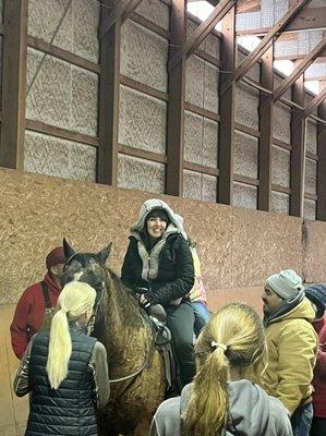 Can't fake that smile -- first time to ride a horse