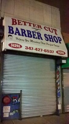 This is a photo of the barbershops exterior.