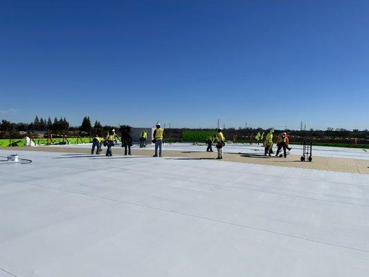 Sacramento Self Storage installing JM TPO 60 mil roofing system.