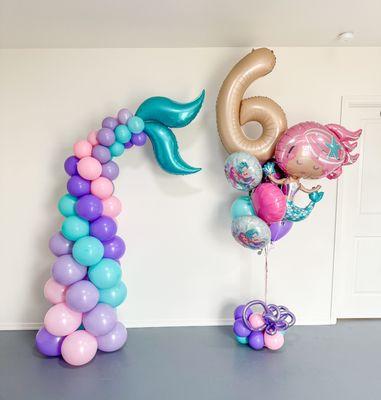 Mermaid tail balloon and helium jumbo balloons are the perfect decor combo for small spaces and restaurants to celebrate in style.