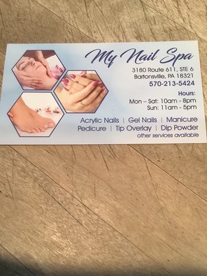 Business card with address, hours and services available.