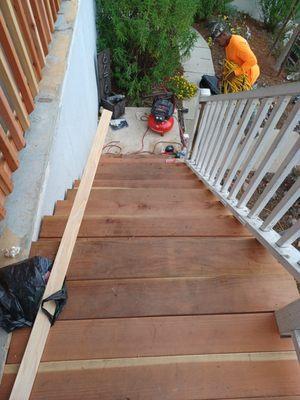 Refurbished stairs using   redwood for treds & risers.