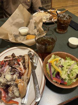 Philly cheesesteak, dinner salad, jalapeño, poppers, crown and sweet tea