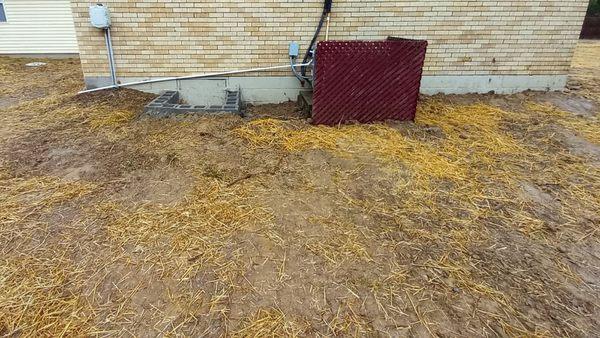 Cinder blocks are on uneven ground and very crooked.