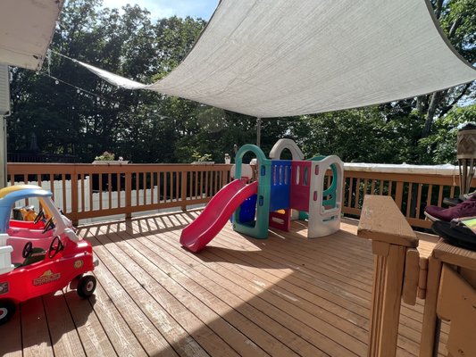 Balcony play area for riding cars.