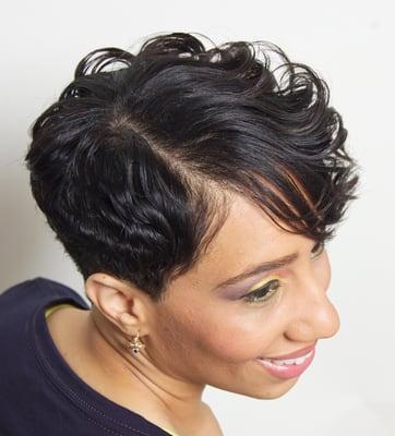 Asymmetric cut, wrap and curl, and makeup