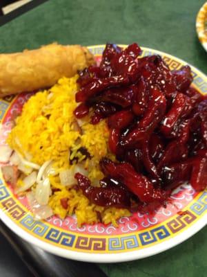 Spare rib and pork fried rice combo platter with egg roll.