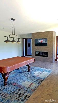 Entertainment Zone TV mount on tile fireplace