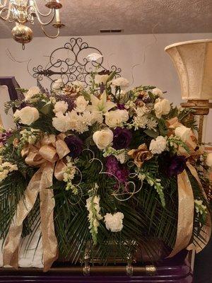 We do fresh and silk casket arrangements. We have balloons, and teddy bears year round. We decorate for weddings, and a Notary.