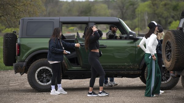 Drive a Bronco on wooded trails