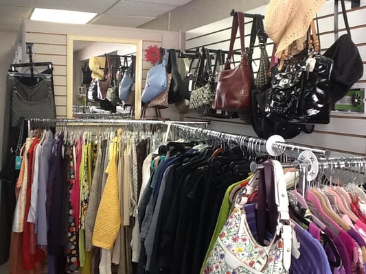 Designer as well as casual clothing all neatly organized. Many wonderful handbags.