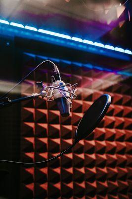 Recording booth interior in (Studio A)(Neumann Tlm 103 condenser microphone)