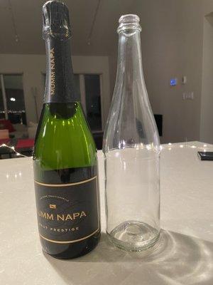 sparkling bottle from Brooklyn brew shop compared to regular sparkling wine bottle: much thinner