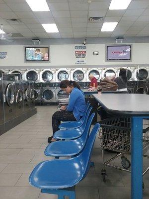 Dryers, lots of TVs.