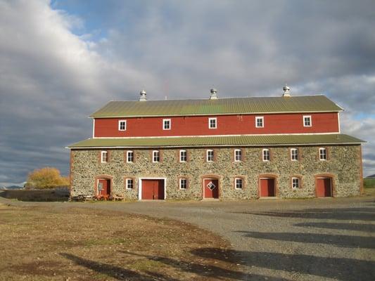 Looking at the barn from the north-west (I think); the small row of windows above the big doors/windows is the venue area