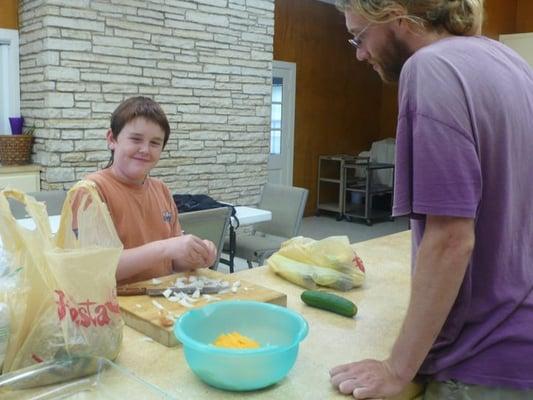 Making a meal in the kitchen.