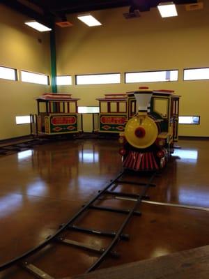 An indoor train ride for children waiting for their appointment