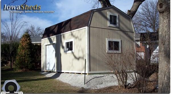 Tall Barn with roll-up door and loft with windows.  Perfect for office, garage, workshop, etc